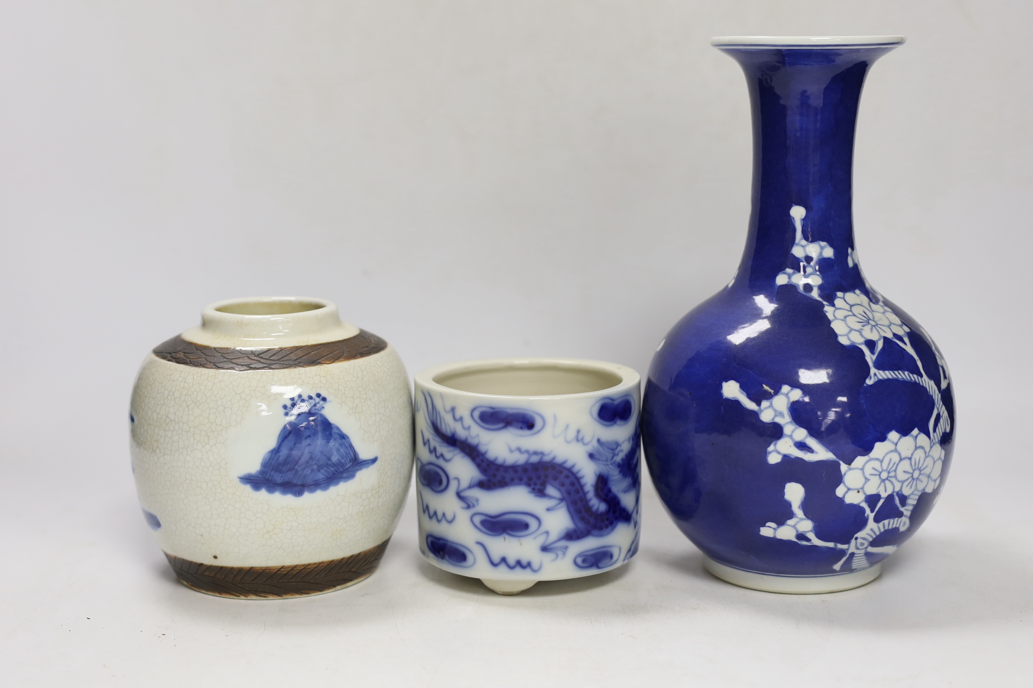 Two Chinese famille rose jars, a similar pot with cover, a brush pot and a vase, 18th century and later, tallest 24cm (5)